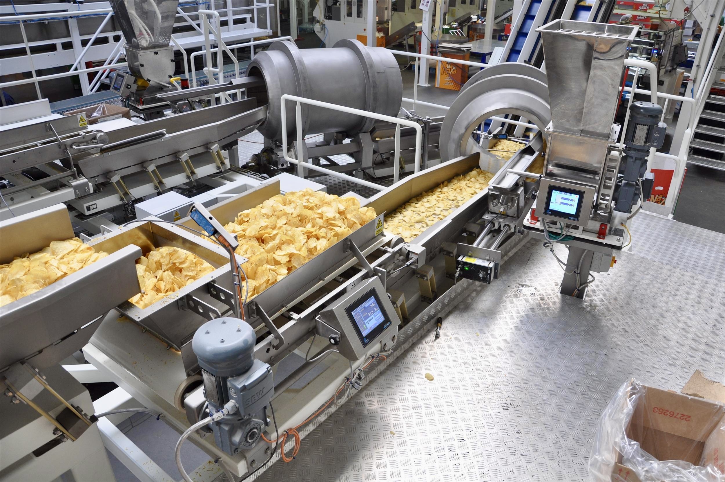 Ważenie przenośnikowe delikatnego produktu spożywczego na linii produkcyjnej